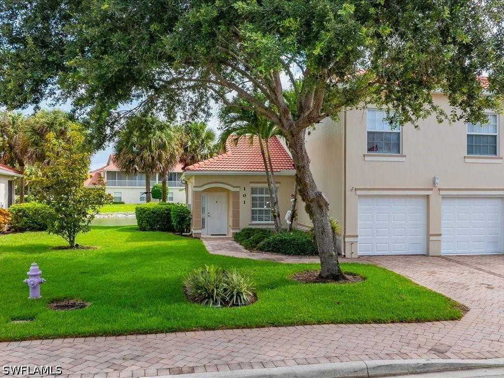 25064 Peacock Ln. #101, Naples, FL 34114