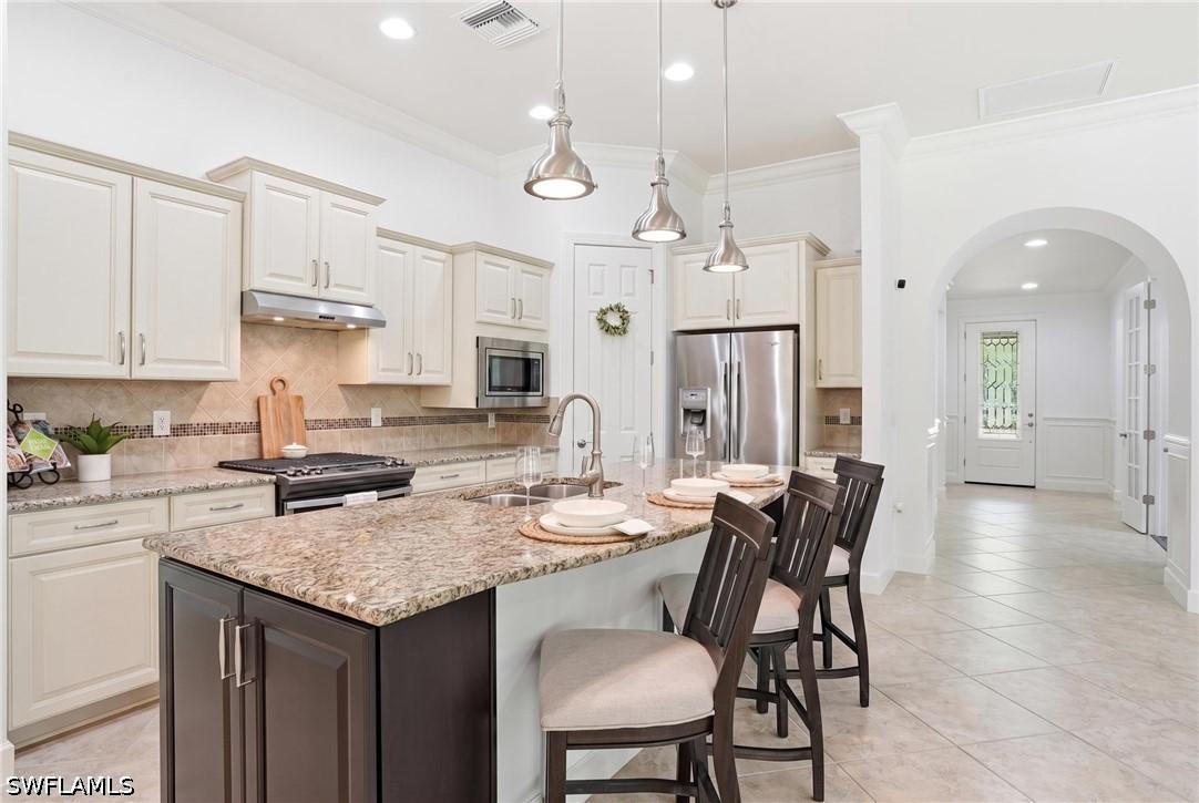 9436 Whooping Crane Way, Naples, FL 34120