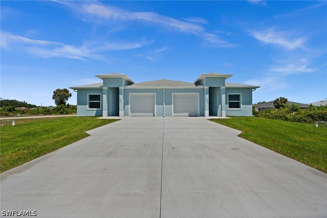 301/303 Pennfield St., Lehigh Acres, FL 33974
