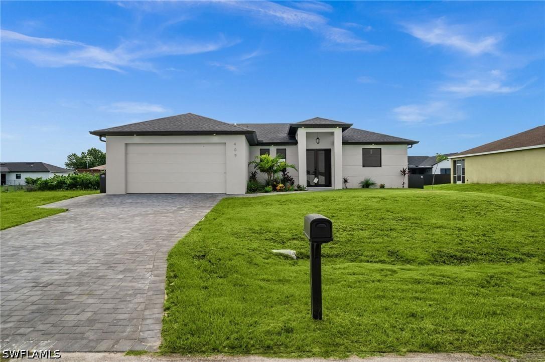 409 NW 25th Pl., Cape Coral, FL 33993