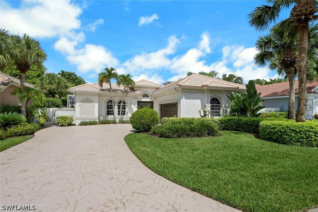 516 Eagle Creek Dr., Naples, FL 34113