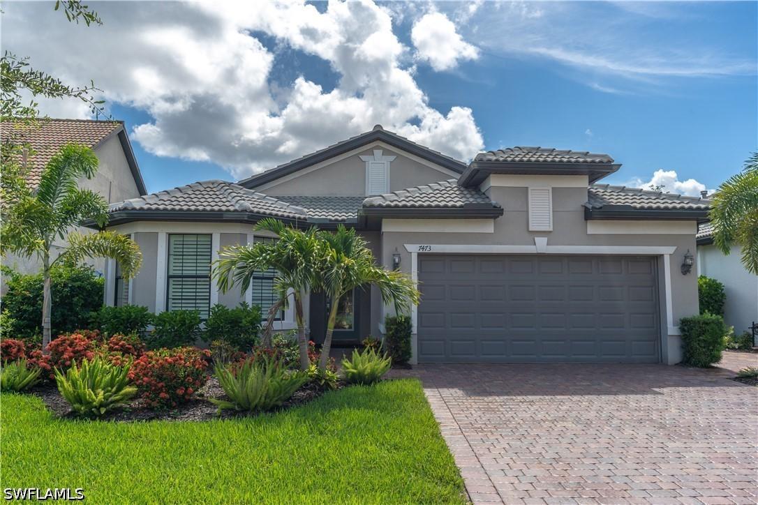 7473 Winding Cypress Dr., Naples, FL 34114