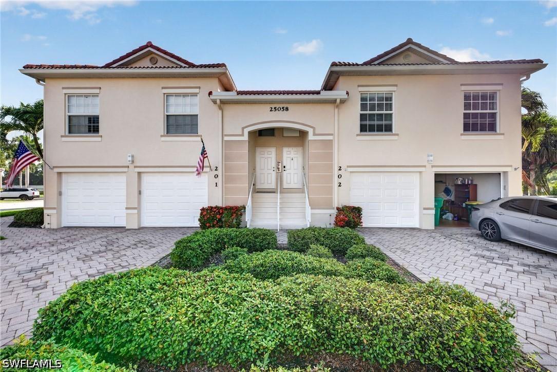 25058 Peacock Ln. #202, Naples, FL 34114