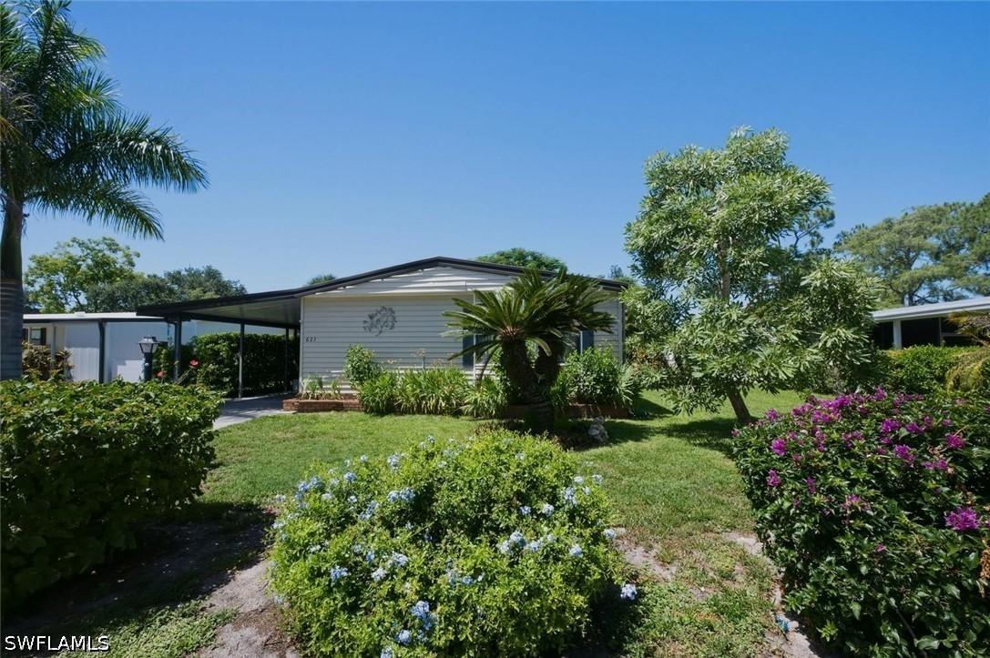 621 Charlemagne Blvd., Naples, FL 34112