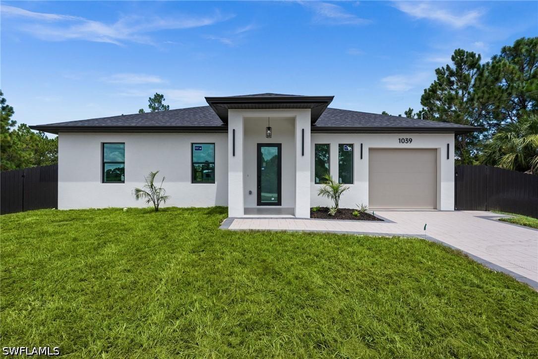 1039 Bassinger Ave., Lehigh Acres, FL 33974