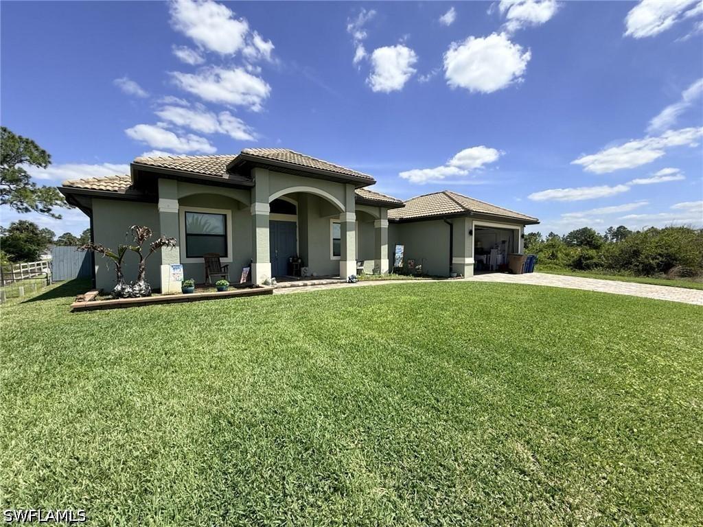 1210 Plumosa Ave., Lehigh Acres, FL 33972