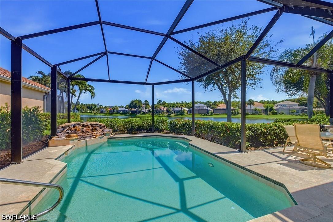 9097 Troon Lakes Dr., Naples, FL 34109
