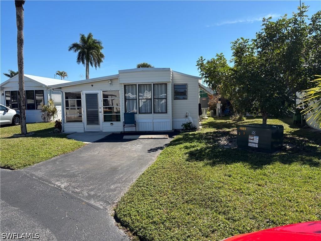 9 Jade Dr., Naples, FL 34114