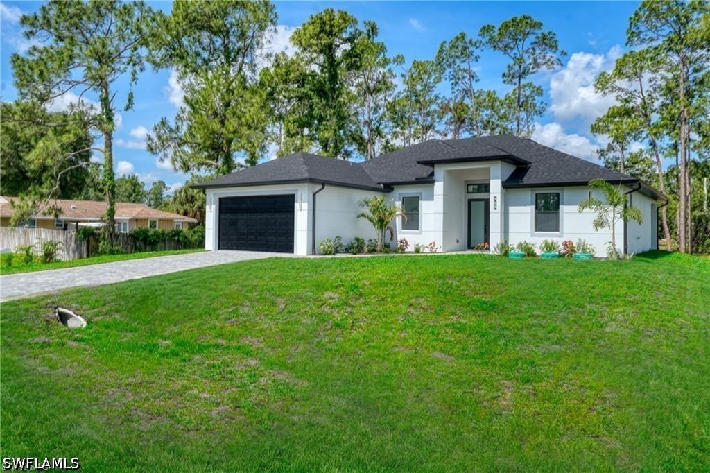 303 Mcarthur Ave., Lehigh Acres, FL 33936