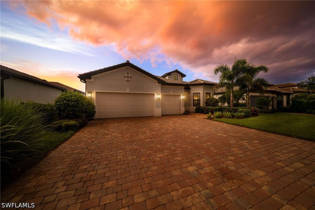 6851 Winding Cypress Dr., Naples, FL 34114