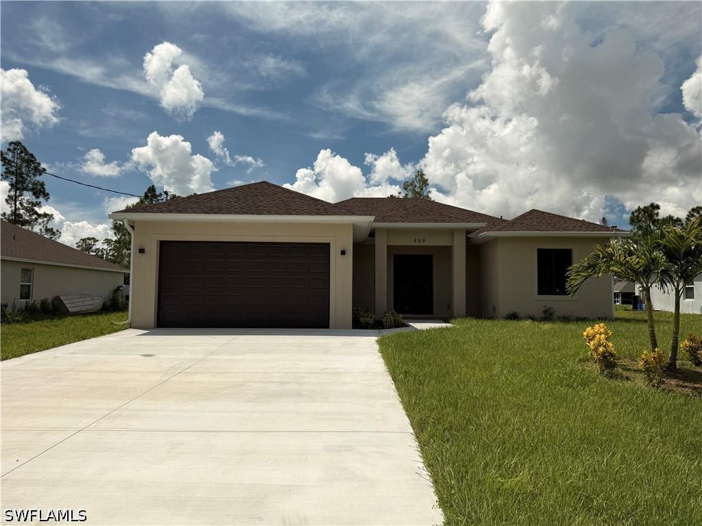 469 Woodman Dr., Lehigh Acres, FL 33972