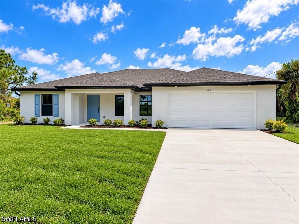 320 Leruth Ave., Lehigh Acres, FL 33974