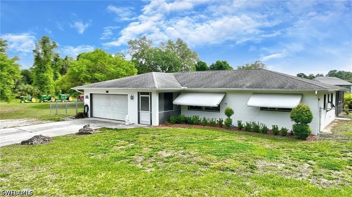 704 Cleveland Ave., Lehigh Acres, FL 33972