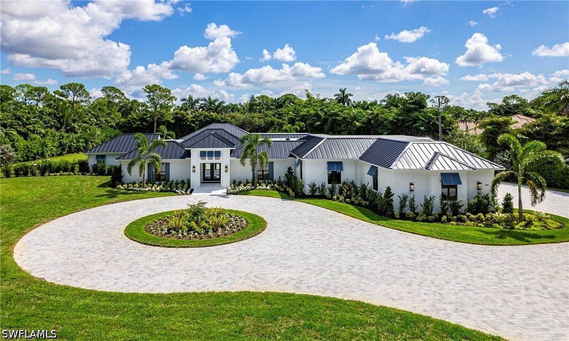 620 Carica Rd., Naples, FL 34108
