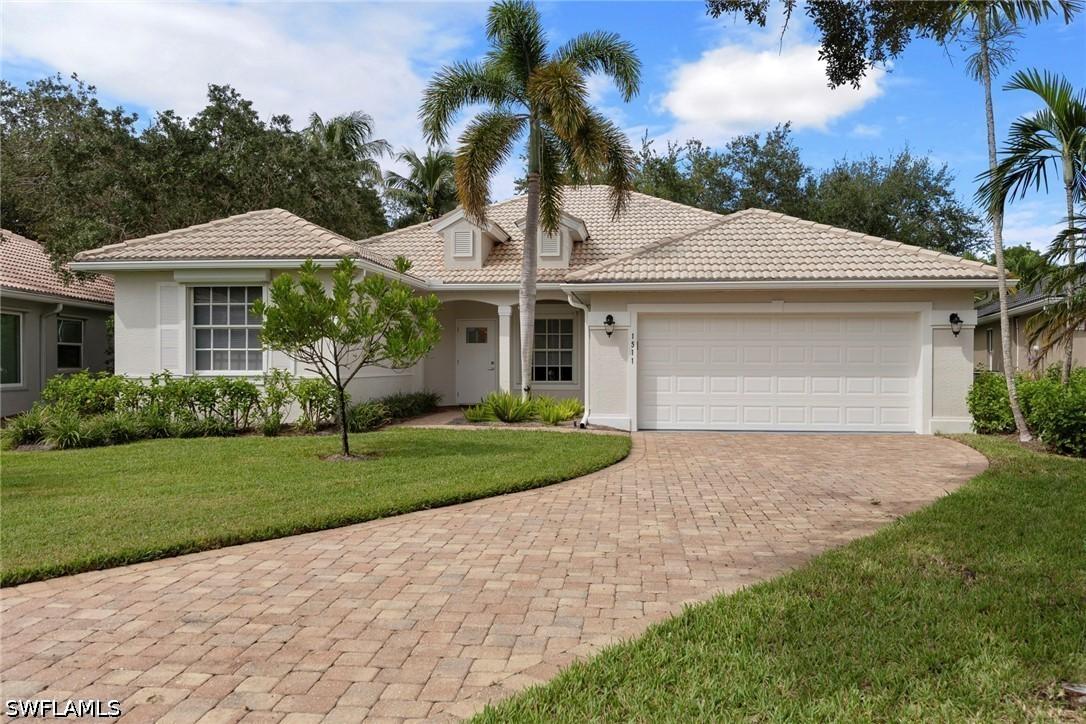 1511 Whispering Oaks Cir., Naples, FL 34110