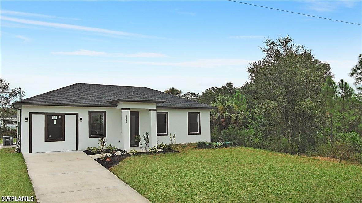 1917 Roderick Ln., Lehigh Acres, FL 33972