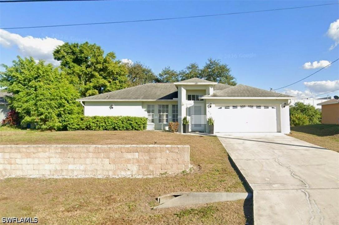 812 Champion Ave., Lehigh Acres, FL 33971