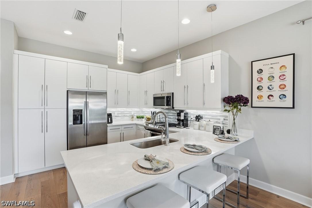 11394 Jacaranda Dr., Naples, FL 34120