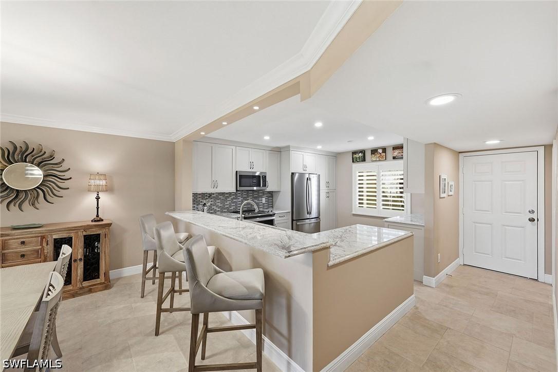 5863 Cobblestone Ln. #F103, Naples, FL 34112