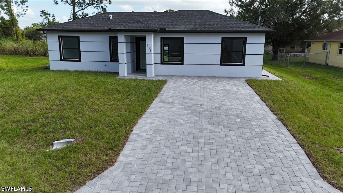 231 Wanatah Ave., Lehigh Acres, FL 33974