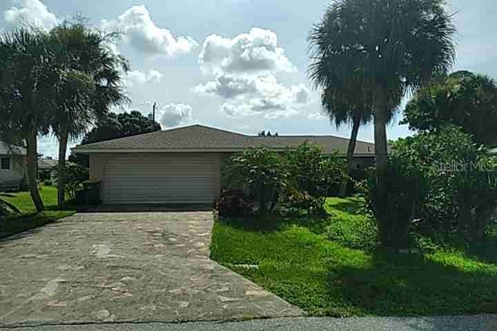 921 Tropical Cir., Port Charlotte, FL 33948