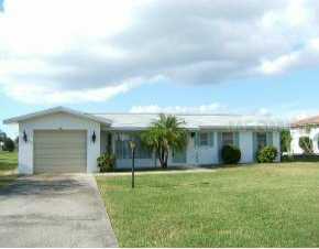 34 Caddy Rd, Rotonda West, FL 33947
