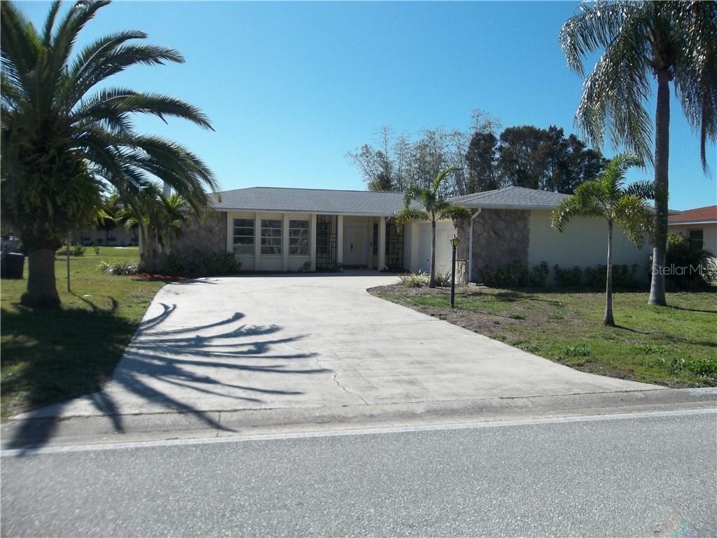 97 Rotonda Cir., Rotonda West, FL 33947