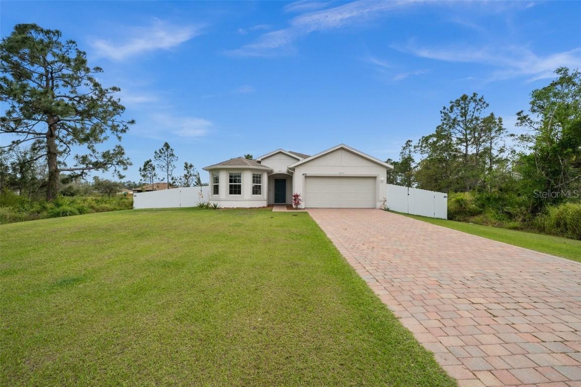 491 Woodman Dr., Lehigh Acres, FL 33972