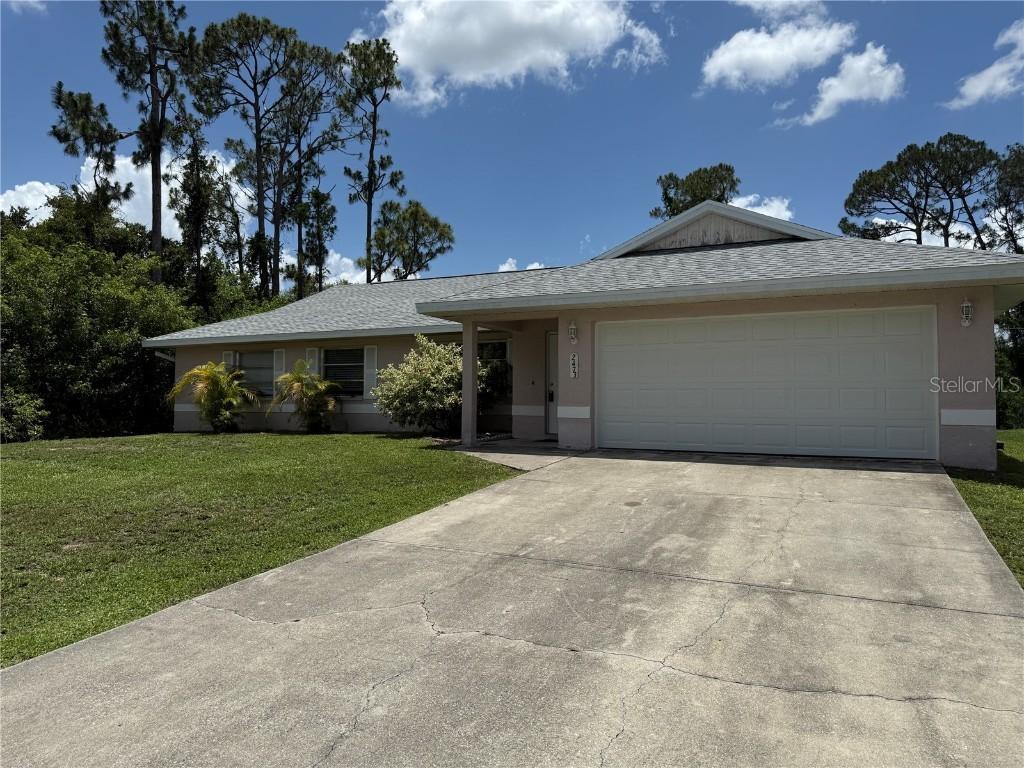 2473 Woodyglen St., Port Charlotte, FL 33948