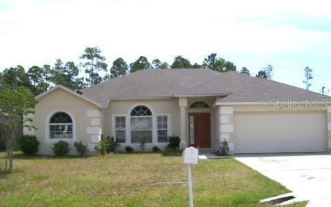 13 Red Clover Ln., Palm Coast, FL 32164