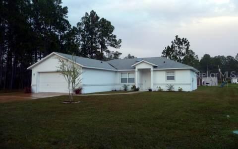 13 Llacer Pl., Palm Coast, FL 32164