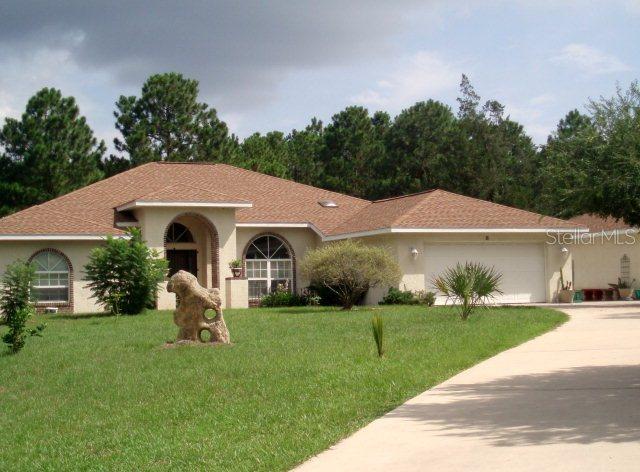 58 Whispering Pine Dr., Palm Coast, FL 32164