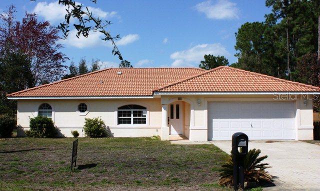 14 Burning Bush Pl., Palm Coast, FL 32137