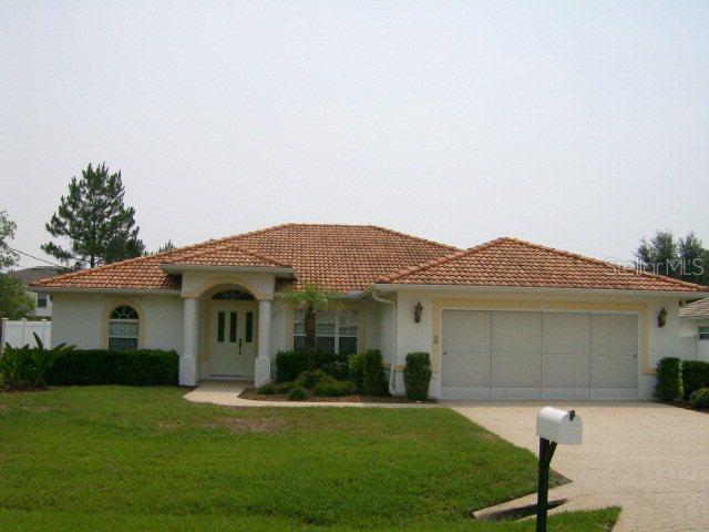 13 Roxanne Ln., Palm Coast, FL 32164