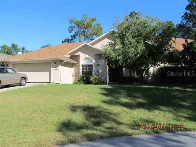 19 Woodguild Pl., Palm Coast, FL 32164