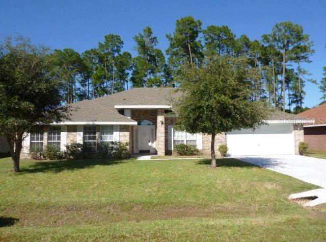 83 Woodside Dr., Palm Coast, FL 32164