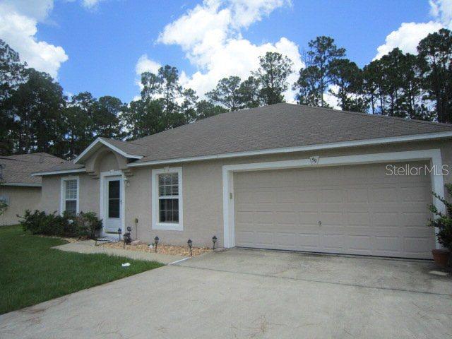 99 Woodside Dr., Palm Coast, FL 32164