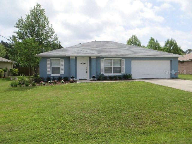 104 Bird Of Paradise Dr., Palm Coast, FL 32137
