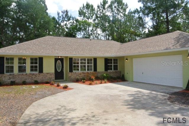 135 Whispering Pine Dr., Palm Coast, FL 32164