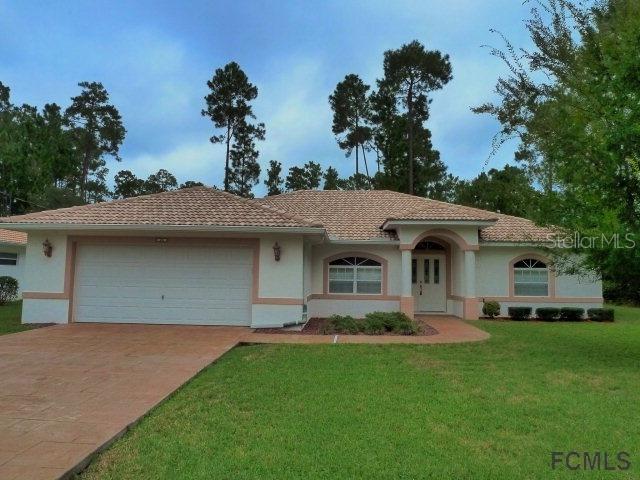 43 Point Of Woods Dr., Palm Coast, FL 32164