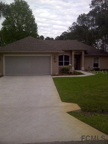 62 Edith Pope Dr., Palm Coast, FL 32164