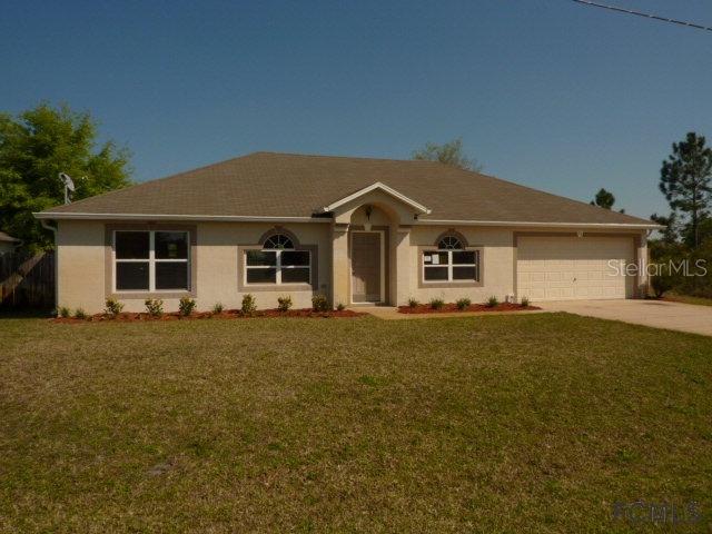 52 Louisville Dr., Palm Coast, FL 32137