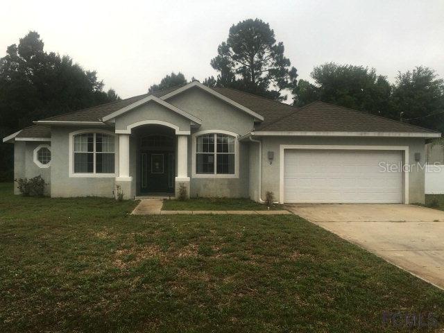 13 Bird Of Paradise Dr., Palm Coast, FL 32137