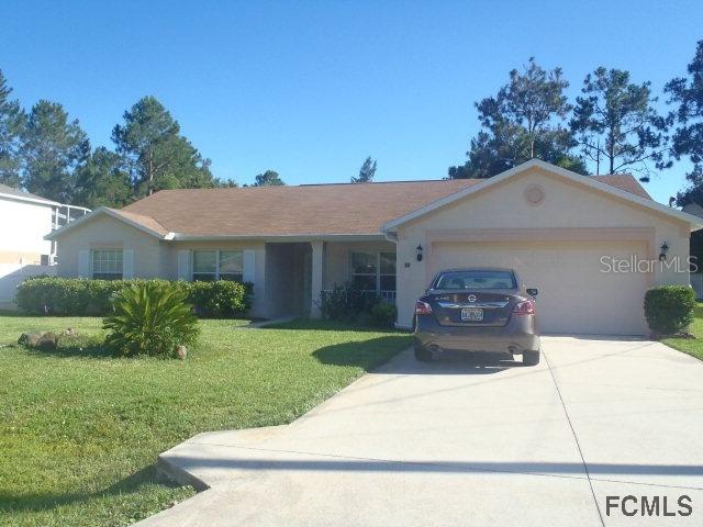 18 White Dove Ln., Palm Coast, FL 32164