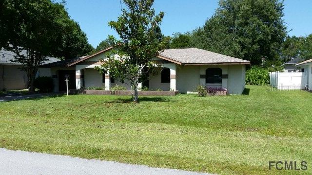 21 Wood Cedar Dr., Palm Coast, FL 32164
