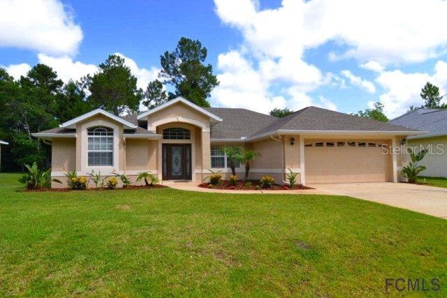 57 Woodbury Dr., Palm Coast, FL 32164