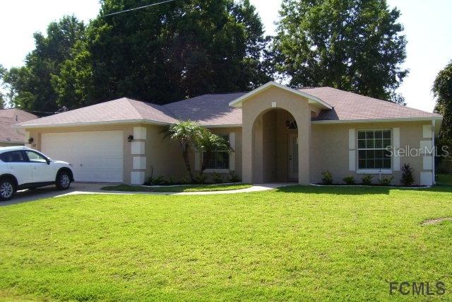 49 Woodbury Dr., Palm Coast, FL 32164