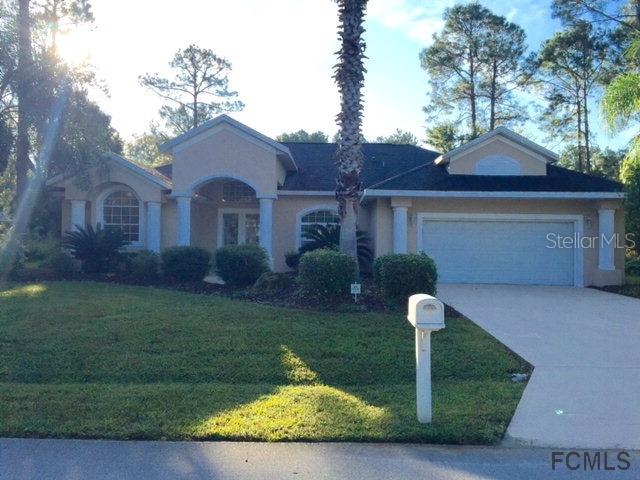 9 Burning Tree Pl., Palm Coast, FL 32137