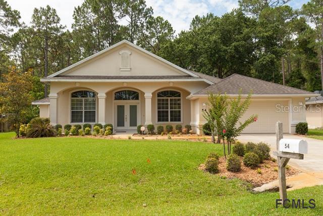 54 Woodworth Dr., Palm Coast, FL 32164