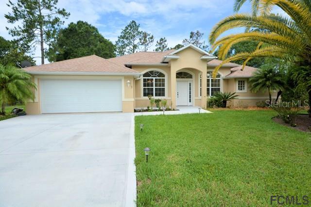 9 Whispering Pine Dr., Palm Coast, FL 32164